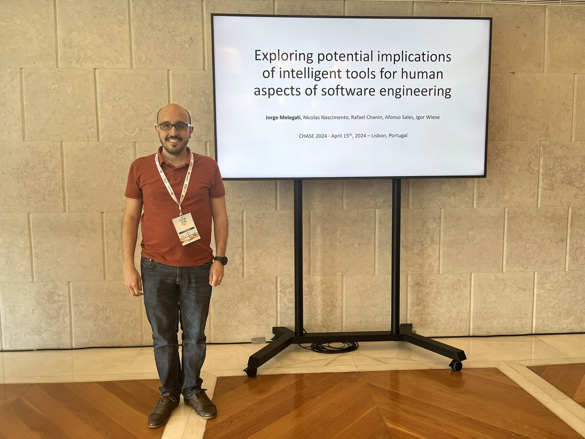 CHASEconf's tweet photo. We’re back from the lunch break and starting the session with  Jorge Melegati presenting:

“Exploring potential implications of intelligent tools for human aspects of software engineering” 

Read the paper here: https://t.co/RNGJEE8AlF

#AI4SE #humanAspects https://t.co/Zxeq6Upv7d