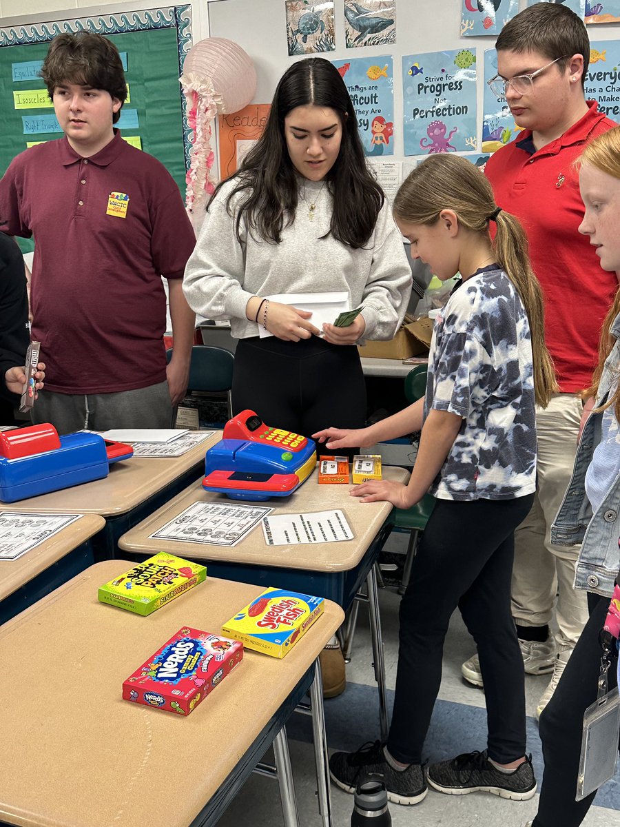 WarwickCTC's tweet photo. The students from The Business Academy of Marketing &amp; Management and Child Development &amp; Education partnered together to teach financial literacy activities/lessons to fifth graders at Warwick Neck Elementary School, on Friday April 12th. #financialliteracy  #wactc #warwickctc https://t.co/QxcWA0XL0g