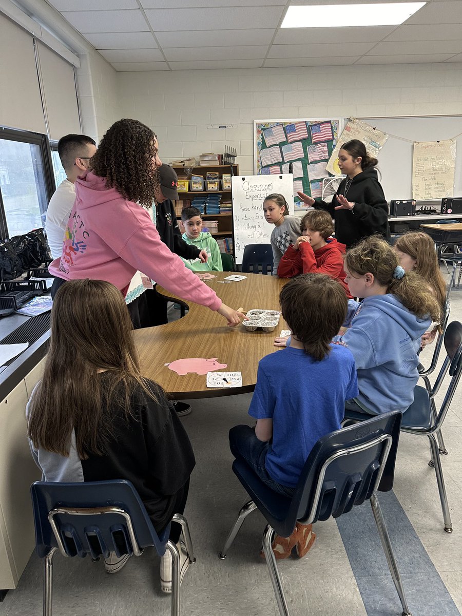 WarwickCTC's tweet photo. The students from The Business Academy of Marketing &amp; Management and Child Development &amp; Education partnered together to teach financial literacy activities/lessons to fifth graders at Warwick Neck Elementary School, on Friday April 12th. #financialliteracy  #wactc #warwickctc https://t.co/QxcWA0XL0g