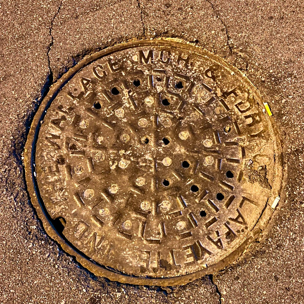 Four old covers from downtown Lafayette, Indiana, for #ManholeCoverMonday 1. Scallop shell (hinged?) 2. Central Union Telephone Co. 3. Lafayette Water Works - 1935 4. The Wallace Machine & Foundry Co. @IronCovers @WaxeWod @chouinardphoto @emb_cit @Minokemeg @jamesfinngarner