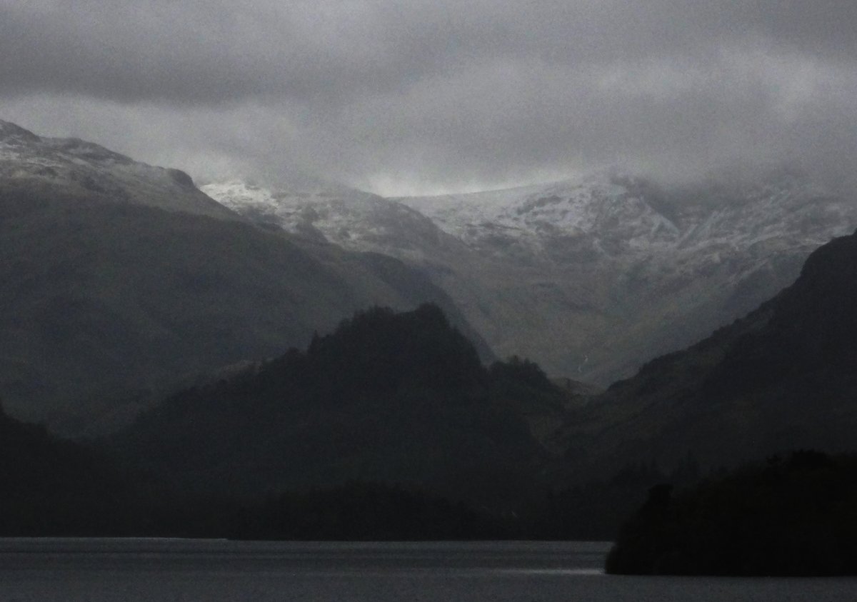 Snow on the higher fells at the southern end of Borrowdale this morning. Castle Crag, once the site of a hill fort in the centre.