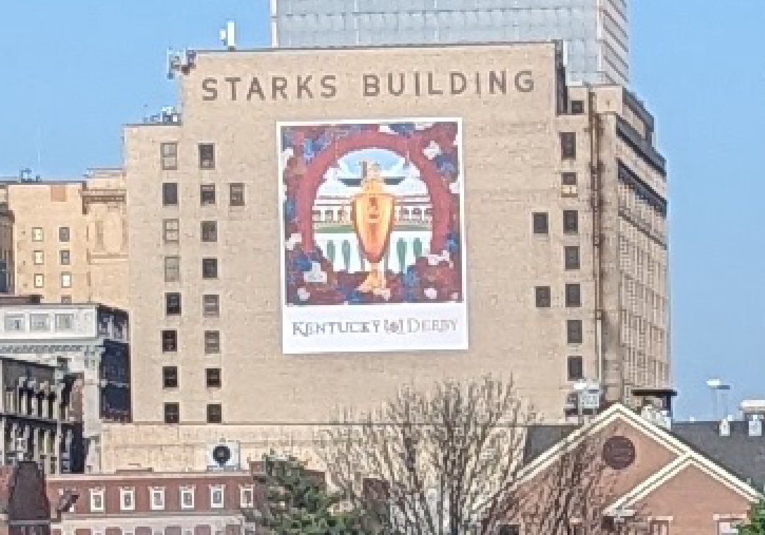 the faded old Diane's Louisville poster that's been junking up the Starks Building for over a decade has been replaced!