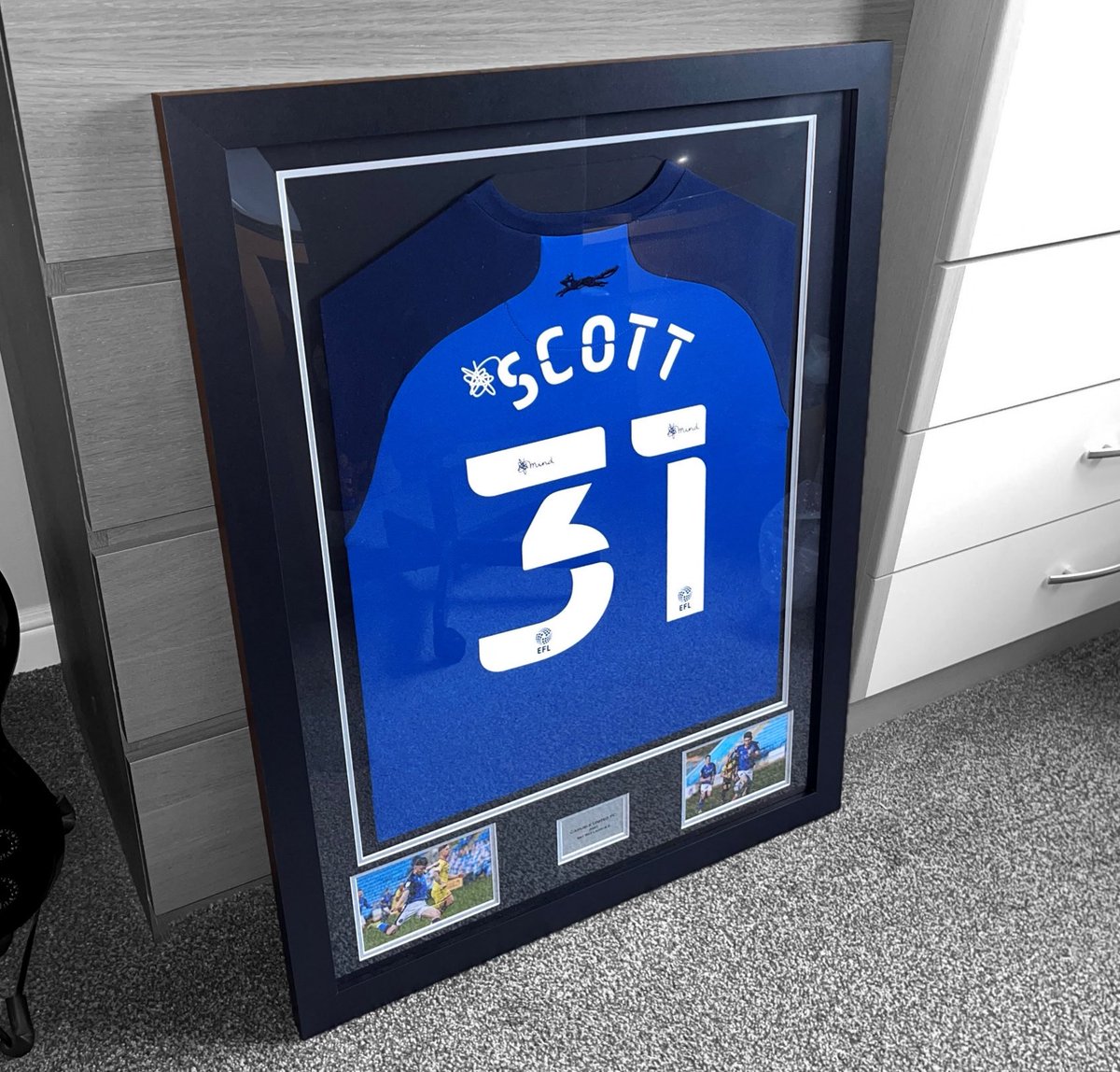 Cedwyn Scott
Carlisle United - 2021

@scottcedwyn 
<a href="/officialcufc/">Carlisle United</a> 

Framed in our Large Black and Silver Frame

#football #footballshirt #footballkit #frame #smallbusiness  #business #sidehustle #footballmemorabilia #efl #nottscounty #footballleague #carlisle #cufc #carlisleunited
