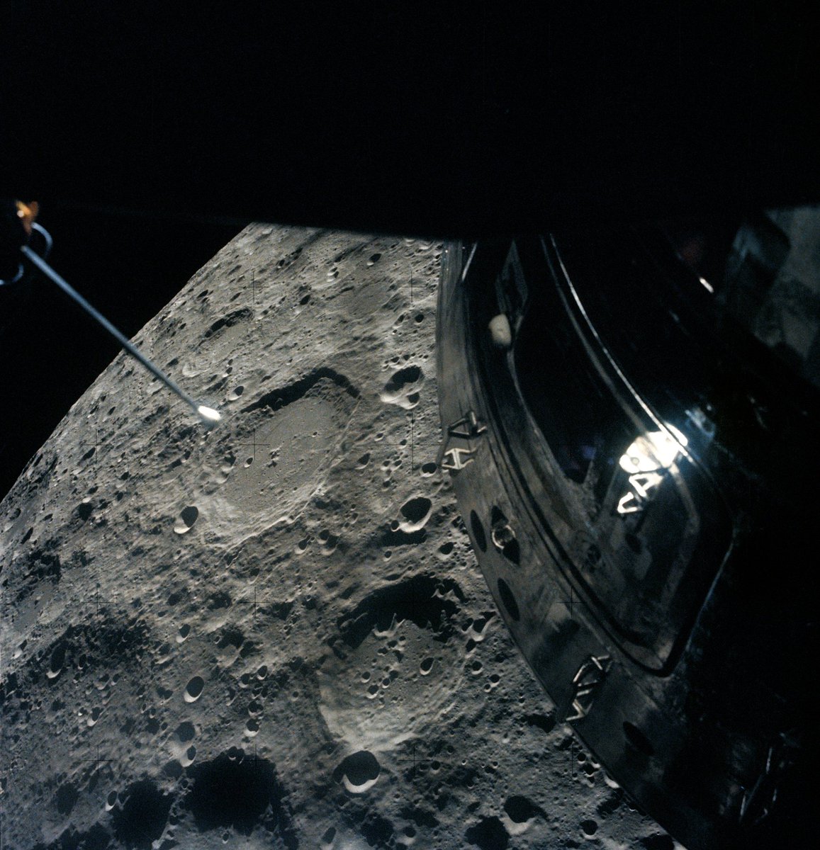 The crew of Apollo 13 took photos from their Lunar Module 'life boat' on April 14, 1970, as they slingshot around the Moon to get back to Earth as quickly as possible. The Command Module (right) had been shut down to conserve resources for reentry. go.nasa.gov/43VIO4h