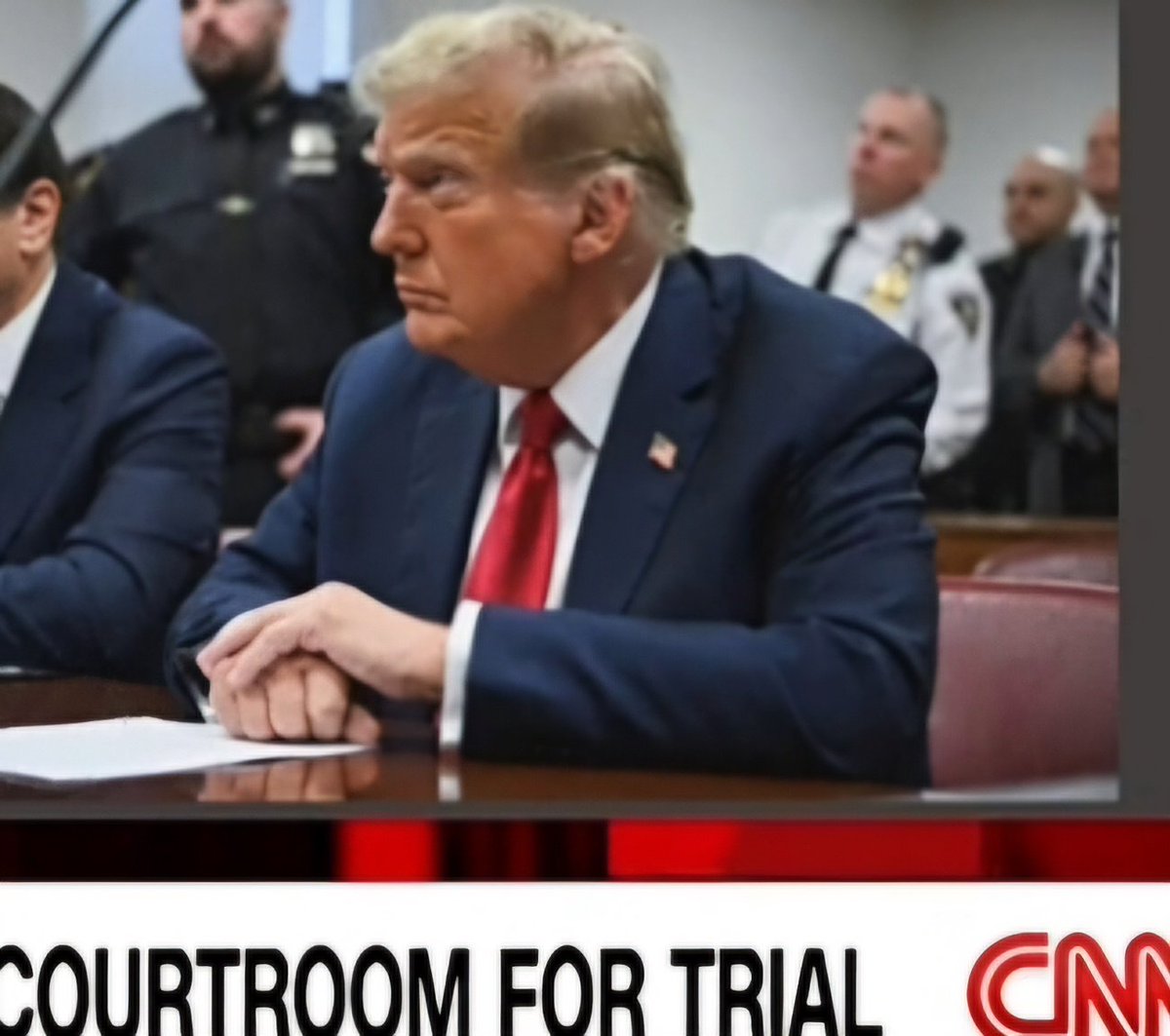 Wow. Let's start with the obvious disparity in his flesh tones. His hands vs. his face. Enough said. We can move on to the hair. He still uses Dapper Dan hair grease from the 1950's to slick the hair over his left ear. It looks like Got2BeGlued hair gel that hasn't dried yet.