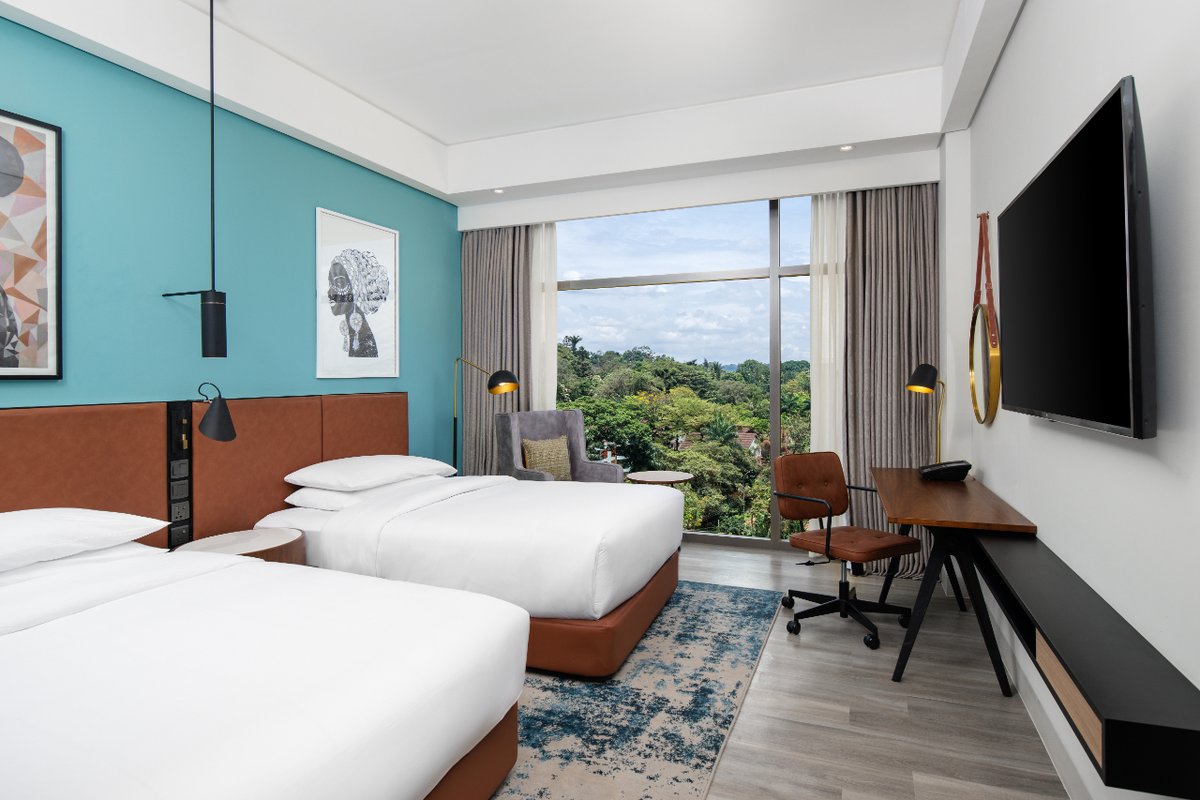 Kampala-bound for business? Our rooms are your perfect sanctuary! Upgrade your business trip with our stylish rooms & suites. Standard, Corner, Executive, Presidential - find your perfect productivity zone. Call +256200730000 to book your stay today.