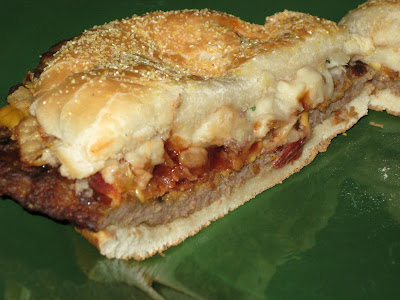 Snack_Memories's tweet photo. Burger King Loaded Steakhouse Burger (2008-2009): Part of the "Steakhouse" line, this variant featured a cubed angus steak patty, topped with bacon, American cheese, A1 steak sauce, crispy onion straws, and creamy "loaded" mashed potatoes, on a cornmeal-dusted bun https://t.co/Z0ZTxy0k4R