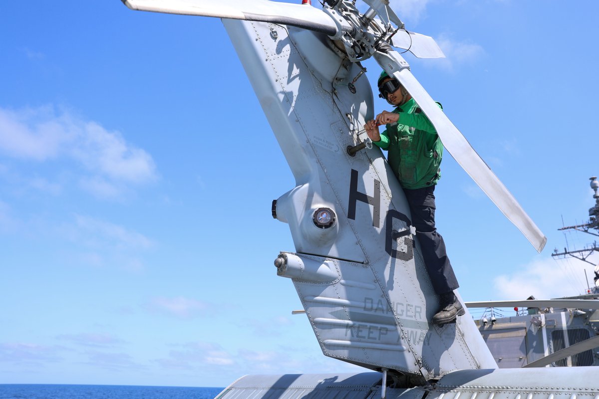 ⚓USS Roosevelt Flight Operations,🚁 #JustAnotherDayUnderway Landing Safety Officer Lt. Cmdr. Tyler Boston, assigned to Helicopter Maritime Strike Squadron (HSM 79), briefs the Helicopter Aircraft Commander prior to flight operations aboard USS Roosevelt (DDG 80).