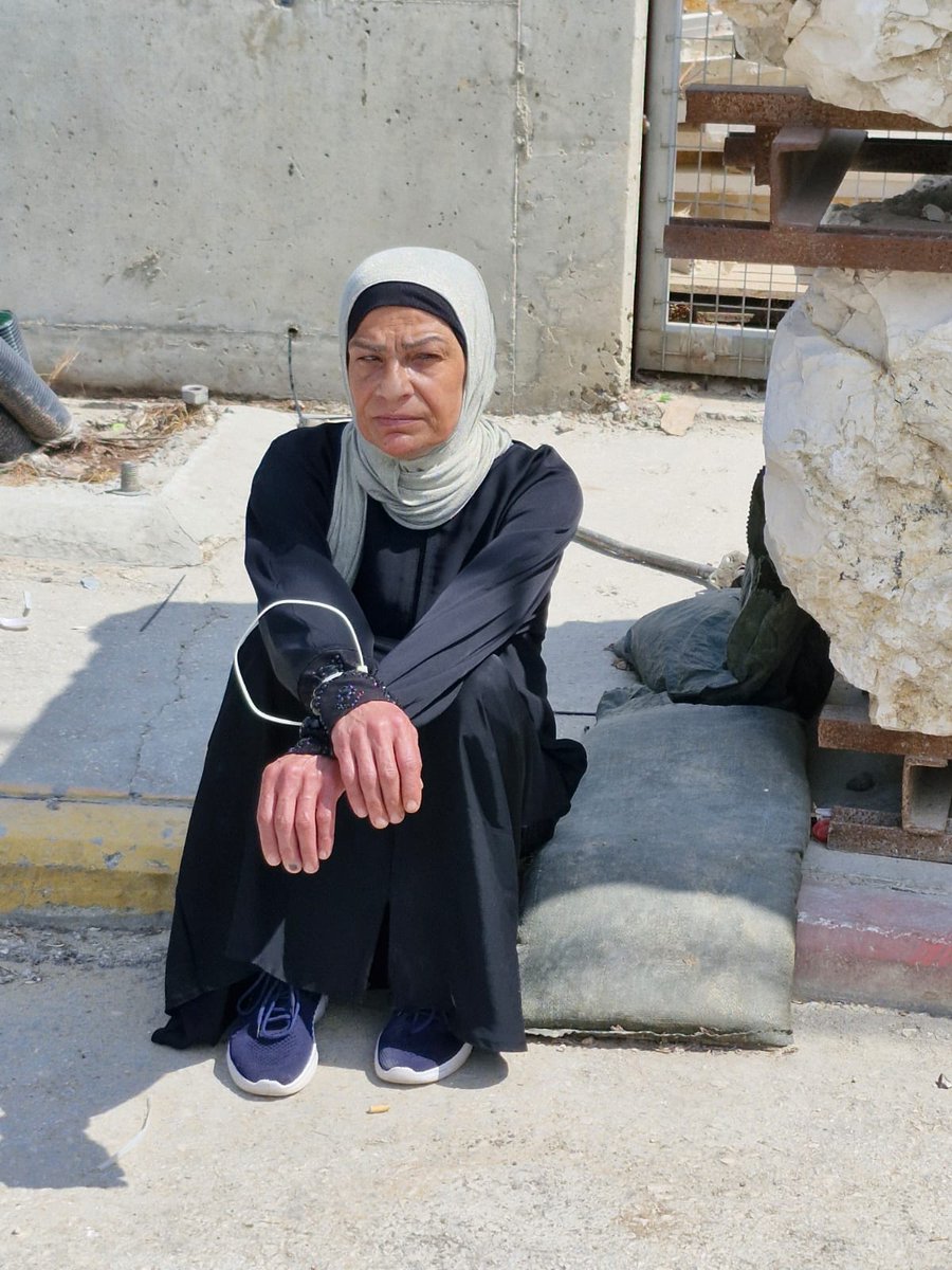 After detaining her for hours, Israeli occupation forces released the grandmother of the martyr Yazan Okoub at Deir Sharaf checkpoint west of Nablus, alleging she was about to perform a stabbing attack.