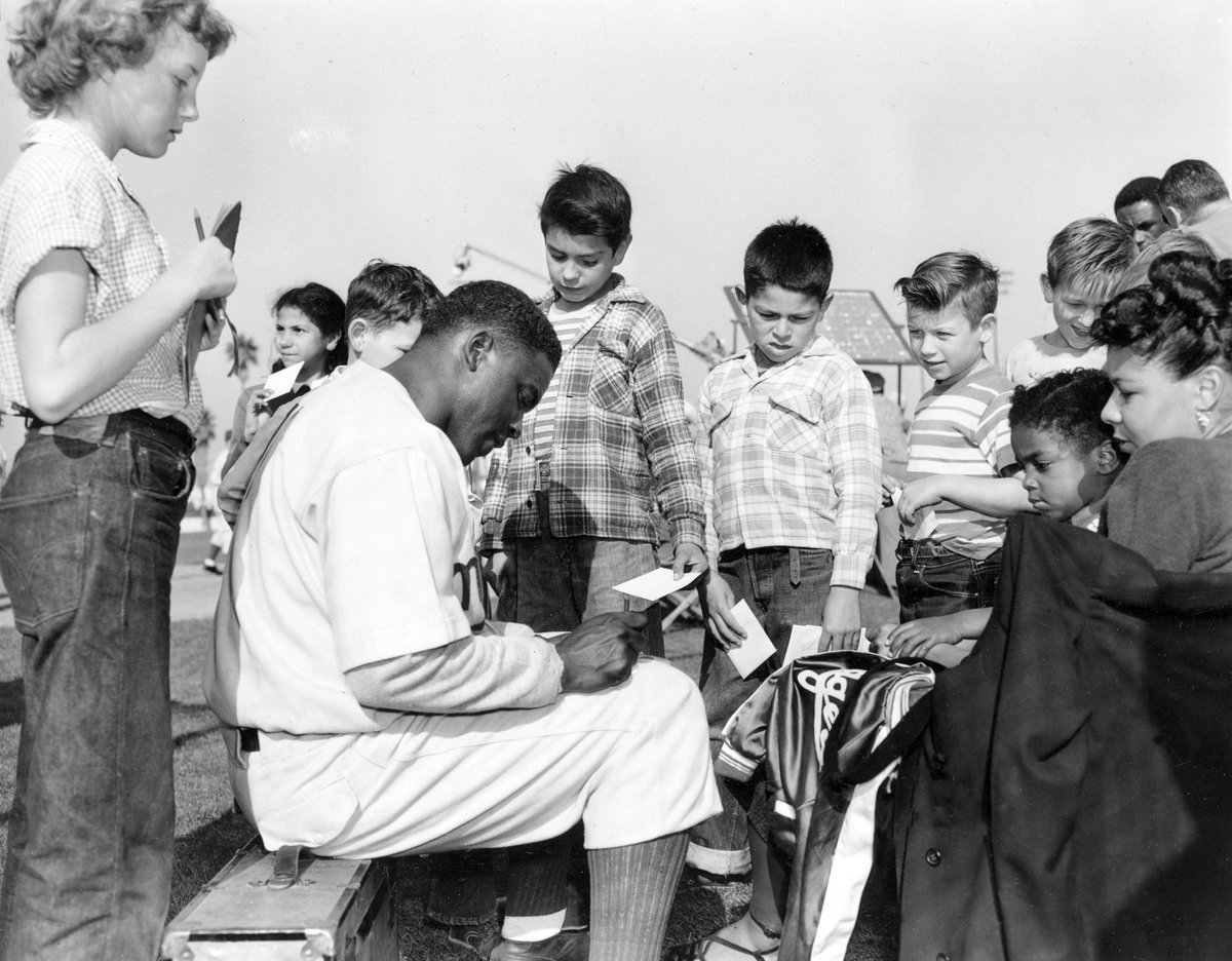 MLB's tweet photo. Jackie Robinson struck a chord with children.

Here he is signing autographs in Anaheim, CA in 1950. #Jackie42 https://t.co/Cc9OUDVTnx