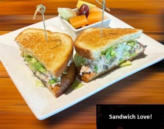 Sandwich Love! Step into the warmth of the day and join us for a culinary delight: our Chicken Grape Honey Pecan Salad sandwich. Crafted with care, it's a symphony of flavors - tender chicken, sweet grapes, honey, pecans, and celery on sourdough!