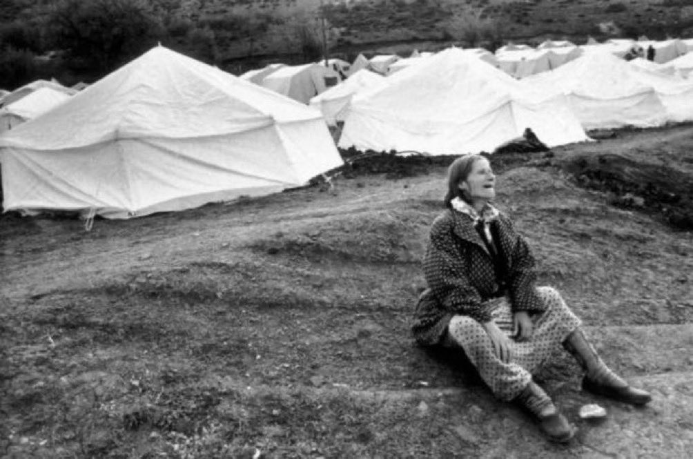 Kosovar Albanian refugee in a camp in Blace North Macedonia. 15 April,1999 . 𝙿𝚑𝚘𝚝𝚘 𝚋𝚢 𝙽𝚊𝚖 𝙷𝚞𝚗 𝚂𝚄𝙽𝙶
