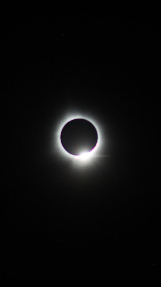 Deltoro_PR's tweet photo. @DruePhoto I bought a Rebel T6 for the eclipse, 300mm kit lens. Couldn’t get it to focus. My roomate, someone with no experience with cameras took a breath taking photo of totality on his iPhone and it’s so much more detailed than mine.. https://t.co/ZCwA3zwhi2