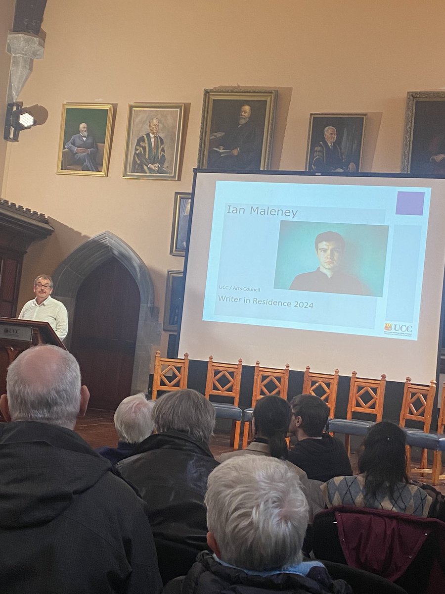 Dr Eibhear Walshe introducing UCC Writer in Residence Ian Maleney at the UCC Creative celebration of the university’s artists in residence for 2024.