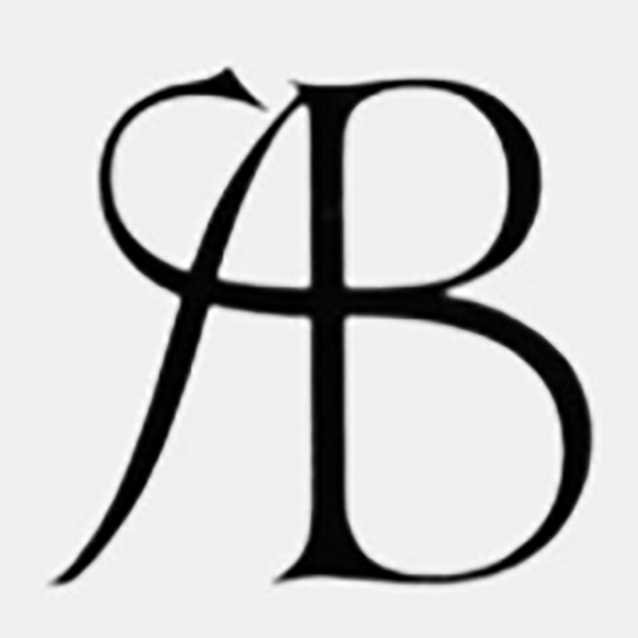 A monogram is a motif where two or more letters are interlaced in such a way that you can't remove one letter without distorting the others. Here is a SAB monogram where the S forms the crossbar on the A and B. If you removed the letters S, A, or B, the symbol would lose meaning