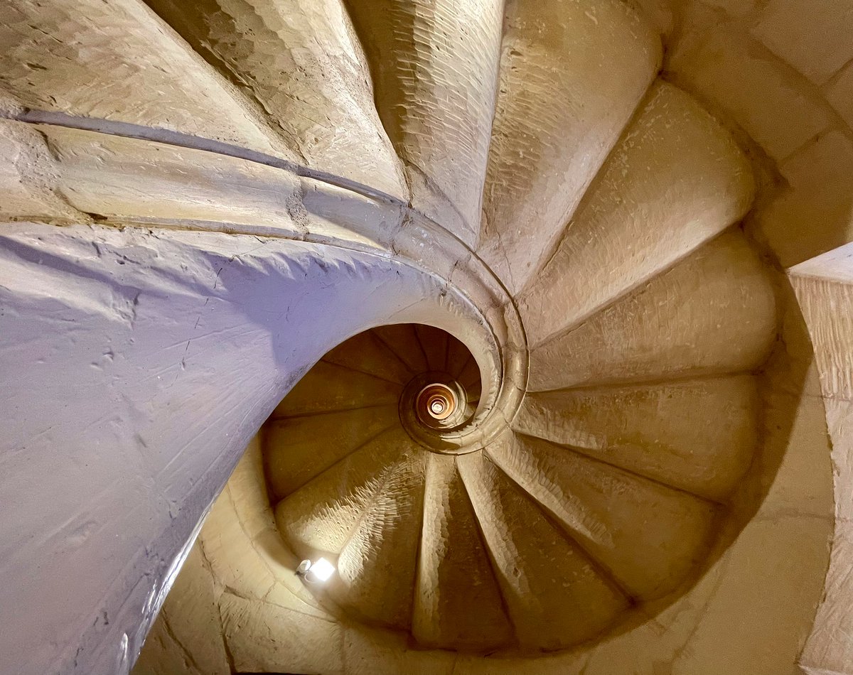 The spiral steps in one of the towers of the Mosta Dome in Malta. Watch a short film here that shows lots more of this building youtu.be/-UABkK4IP-M?si…