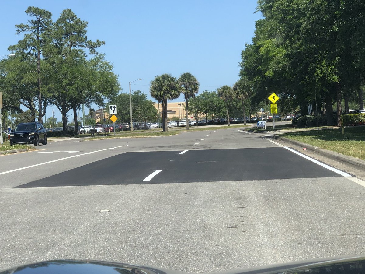 DAYTONA PAVEMENT UPDATE: A small section of Richard Petty Blvd between the speedway and Embry Riddle Aeronautical University has been repaved. There was a large depression in the road here that I once drove thru and thought had ripped every piece of suspension out of my car