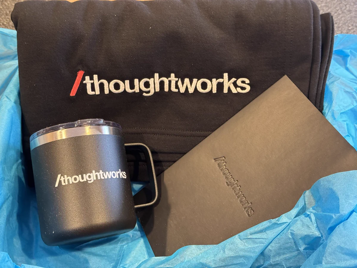 ThoughtWorks welcome pack - blanket, mug, journal.