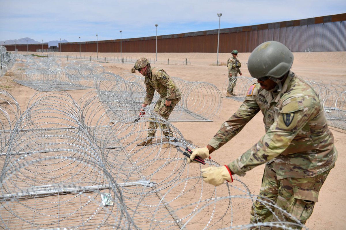 EL PASO, Texas -- Texas National Guard Engineers install anti-climb barrier along the Texas-Mexico border to block illegal entry.