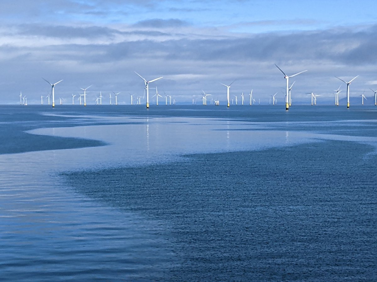 Crow road with wind farm