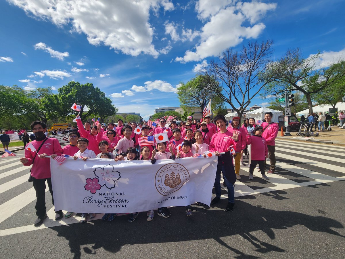 The wind kept the balloons down, but not our spirit! Our staff & their families joined the #CherryBlossFestParade waving Japanese & US flags to celebrate the incredible friendship between our two countries. Thank you to everyone who cheered for us in English & Japanese! 🇯🇵🌸🇺🇸