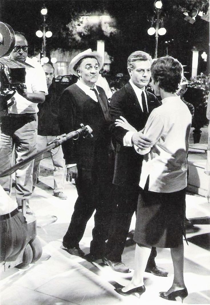 Federico Fellini, Marcello Mastroianni and Anouk Aimée on the set of '8½' (1963) Federico Fellini.