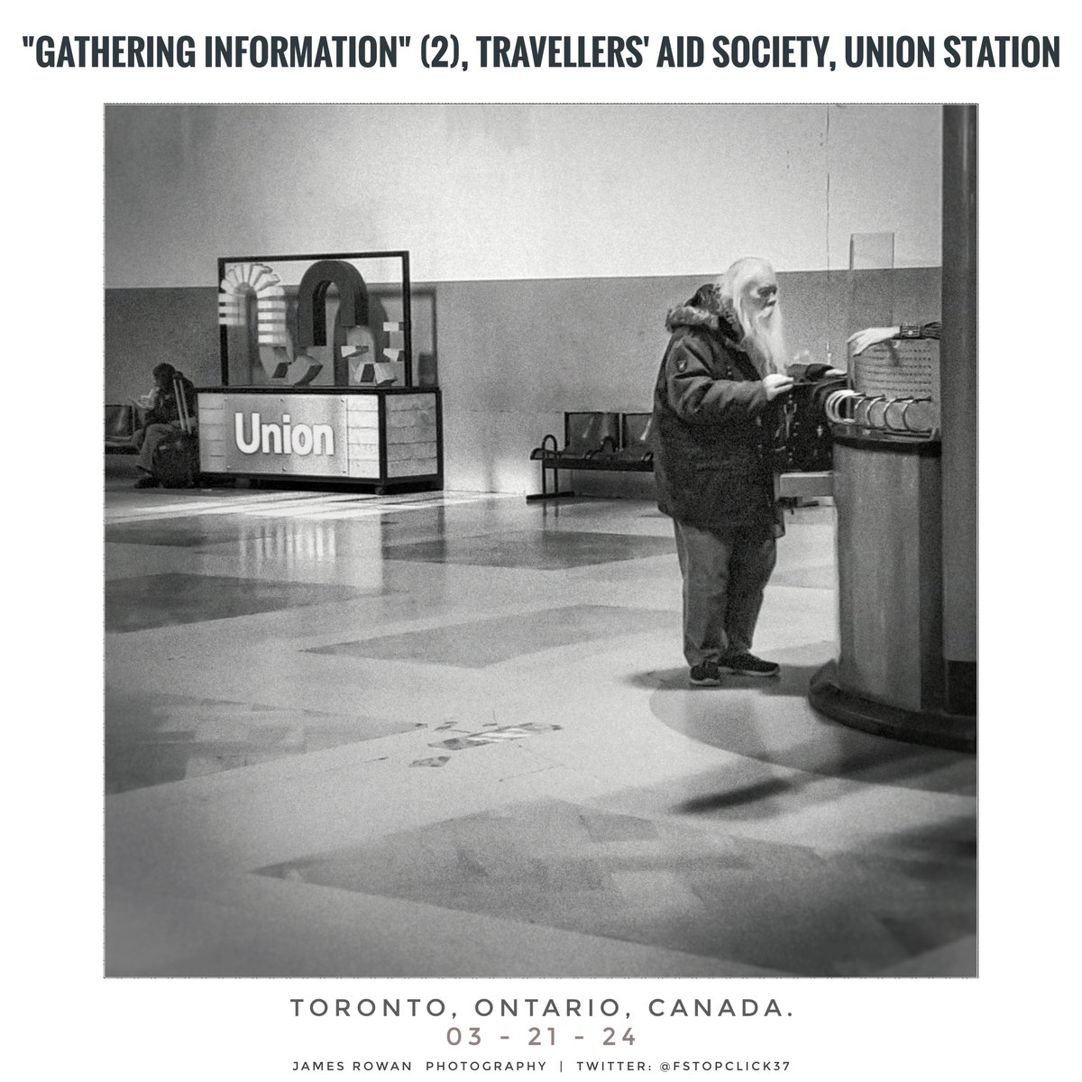 'GATHERING INFORMATION', Travellers' Aid Society, Union Station, Toronto, Ontario, Canada. 03-21-24 📷: J.R. Rowan #photography #Toronto #train #Travel #transportation #ViaRail #architecture #people #streetphotography #information #UnionStation #monochrome #blackandwhite #grain