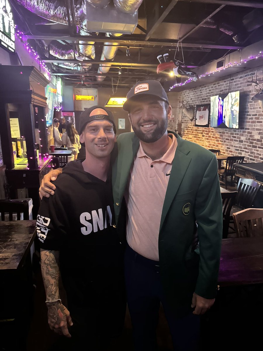 Scottie Scheffler after winning The Masters: 'I'm not even thinking about the green jacket right now. I just want to go home.' The home: a dive bar in Dallas 😂😂 (Photos via @OldRowSports)