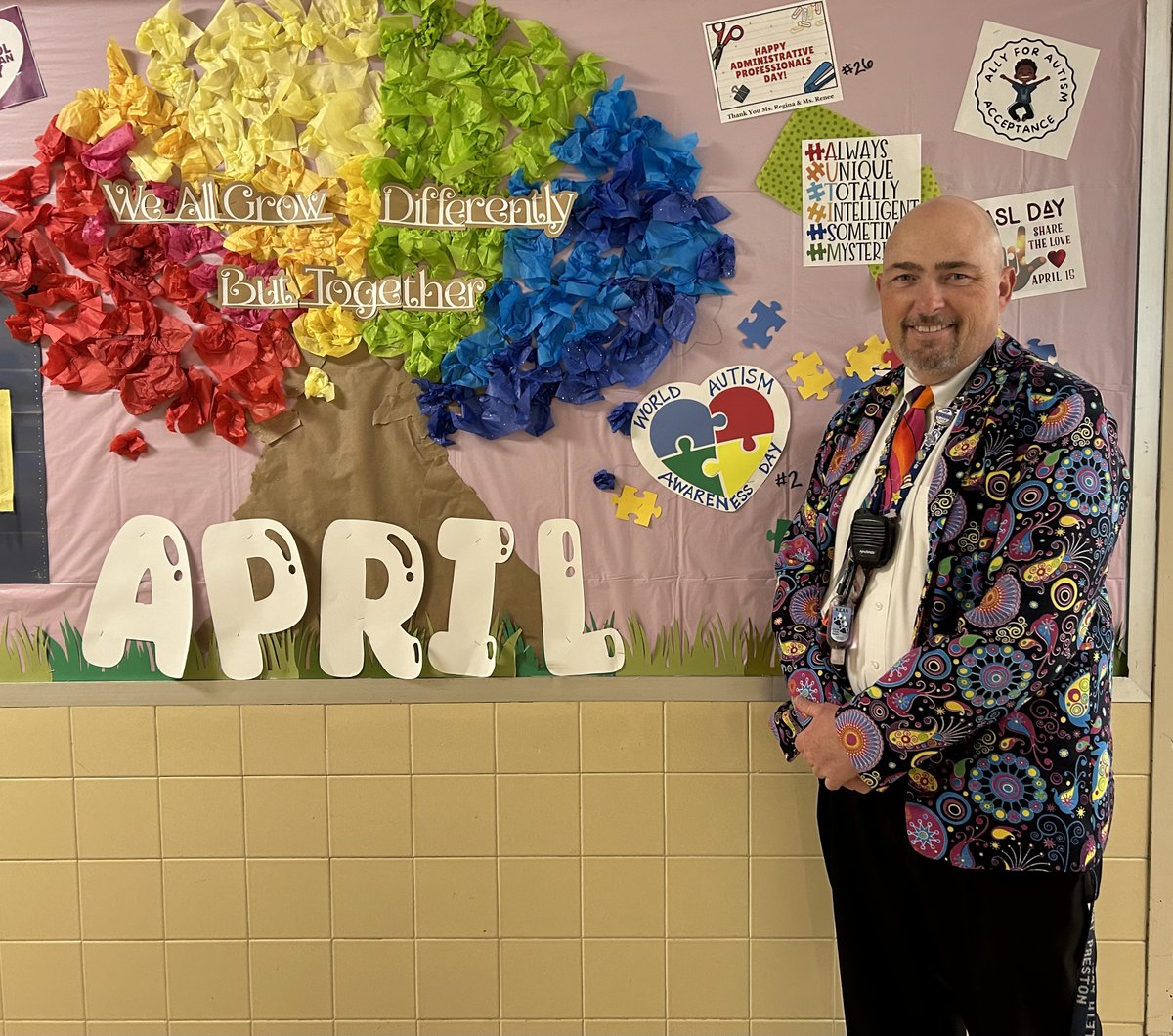 Mr. Preston in his bright attire for day 1 of Autism Awareness Week! We will see you tomorrow in your puzzle piece/mismatched attire because we are all unique!