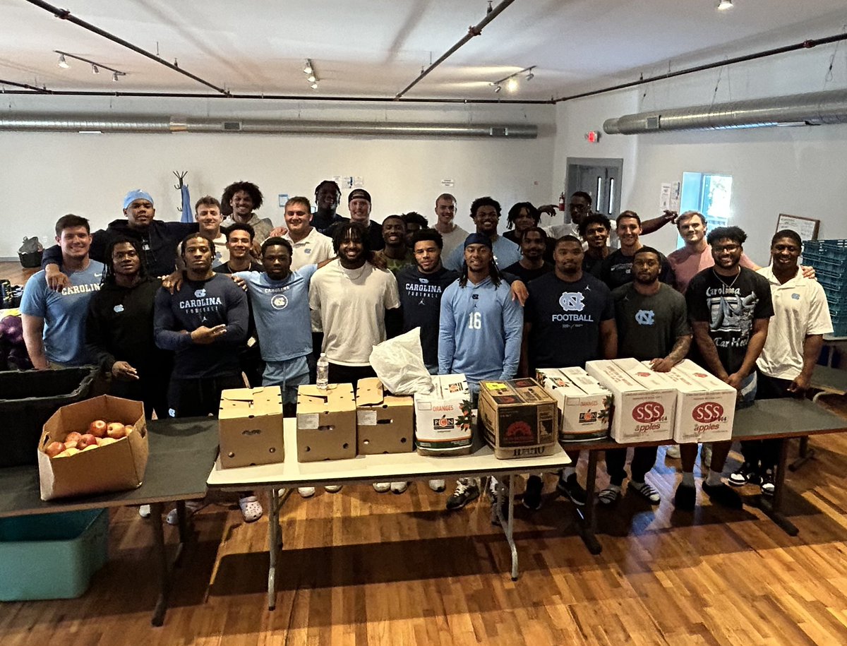 This weekend was a huge success with @uncfootball volunteering at our new space! The guys packed 200 non-perishable bags, feeding 200 kids this week, along with helping clean up!