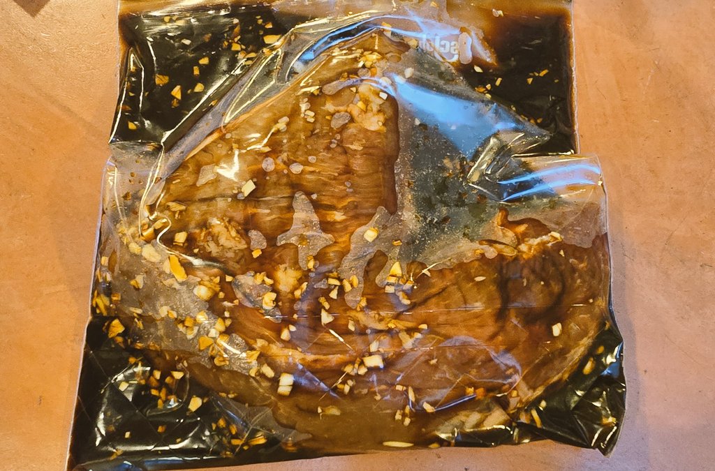 Tri-tip marinating in soy sauce, worcestershire sauce, and garlic for 24 hours. Any time any of you open my fridge, turn the tri-tip and give it a massage.