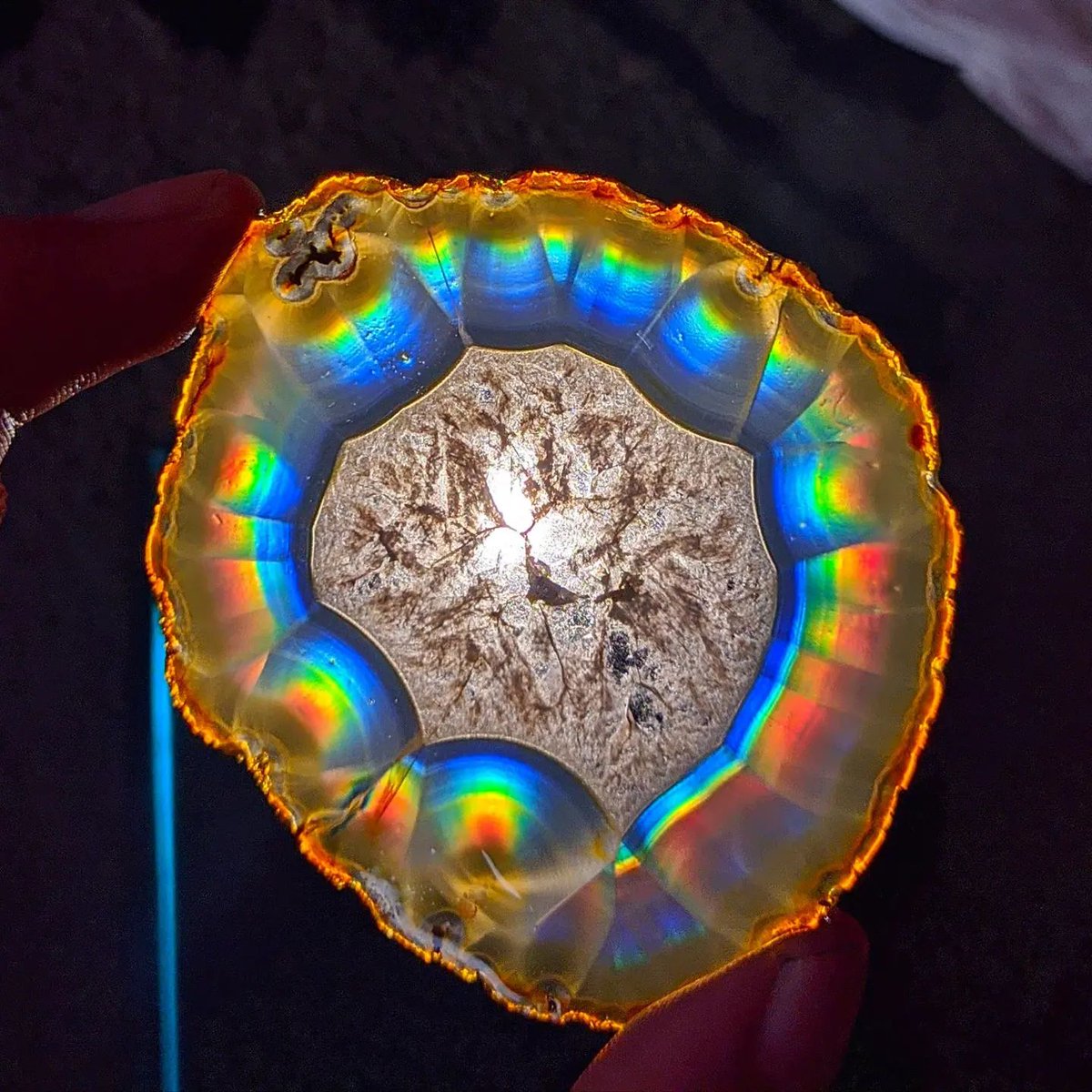 Iris agate is a truly stunning variety of agate that displays a rainbow of colors when held up to light. Photo: Yanzz_Crystals