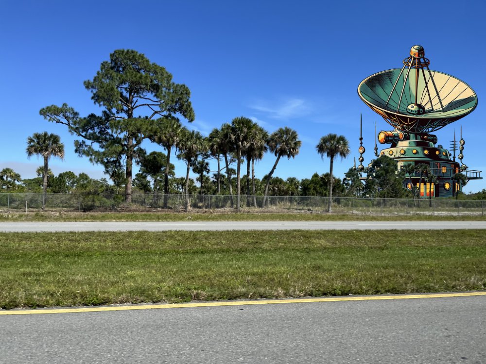 I'm curious, did any other @HackSpaceCon attendees notice something odd about the road to the Kennedy Space Center? That fence looked so familiar, but I couldn't put my finger on it. Then it hit me! #hhc23 #holidayhack #satellitegroundstation #spaceisland