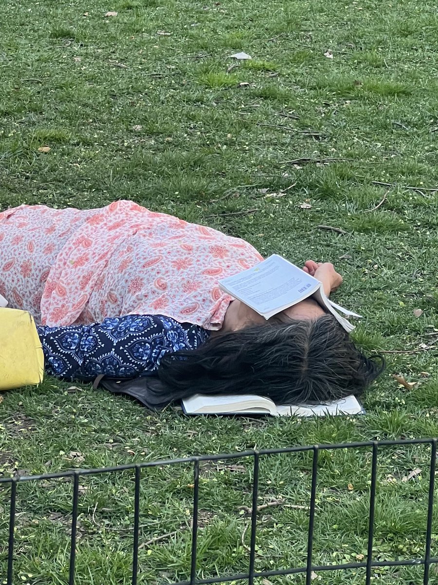 One book as a pillow, the other as a sun shield. I am utterly AGOG