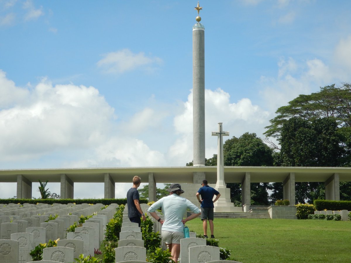 RossWCable's tweet photo. The #AARCStaffRide24 visits Kranji #CWGC where the sacrifice of Australian, British and Commonwealth forces (especially Indian) is made plain. A row of Netherlands East Indies graves also shown. This hill was the rear of the 2/26th Battalion (AIF) defensive position - the scene of heavy fighting on 9 Feb #1942. The cemetery is immaculate as always. @CWGC @DVAAus @DefenceAust