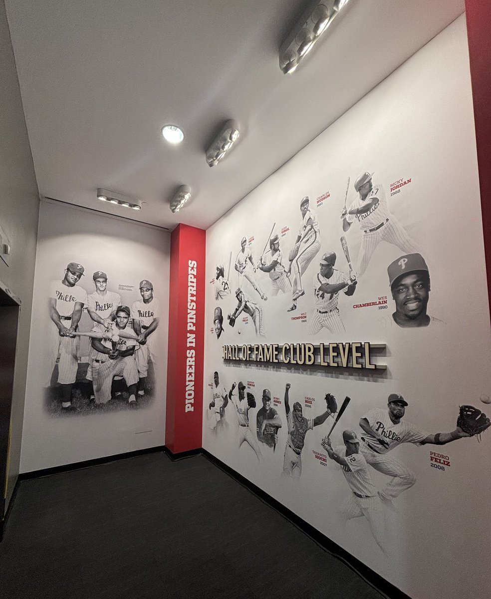 OJPhilly's tweet photo. The Phillies unveiled their new Pioneers in Pinstripes display. It’s a tribute to the Black &amp; Latino players in franchise history. #RingTheBell #Jackie42 https://t.co/Y67oKKQnSo
