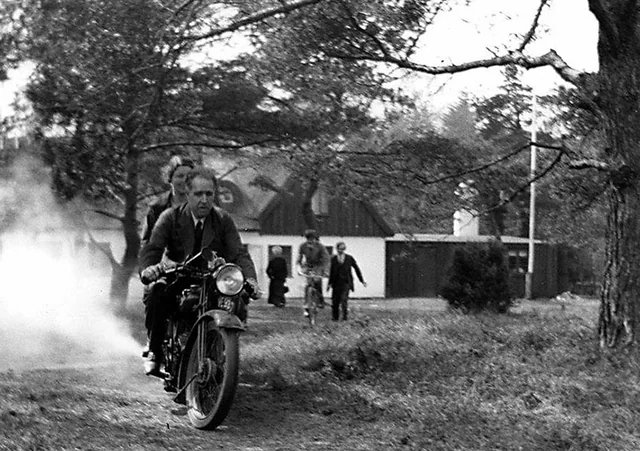 Physicist Niels Bohr and his wife Margrethe on George Gamow's motorcycle in 1931.