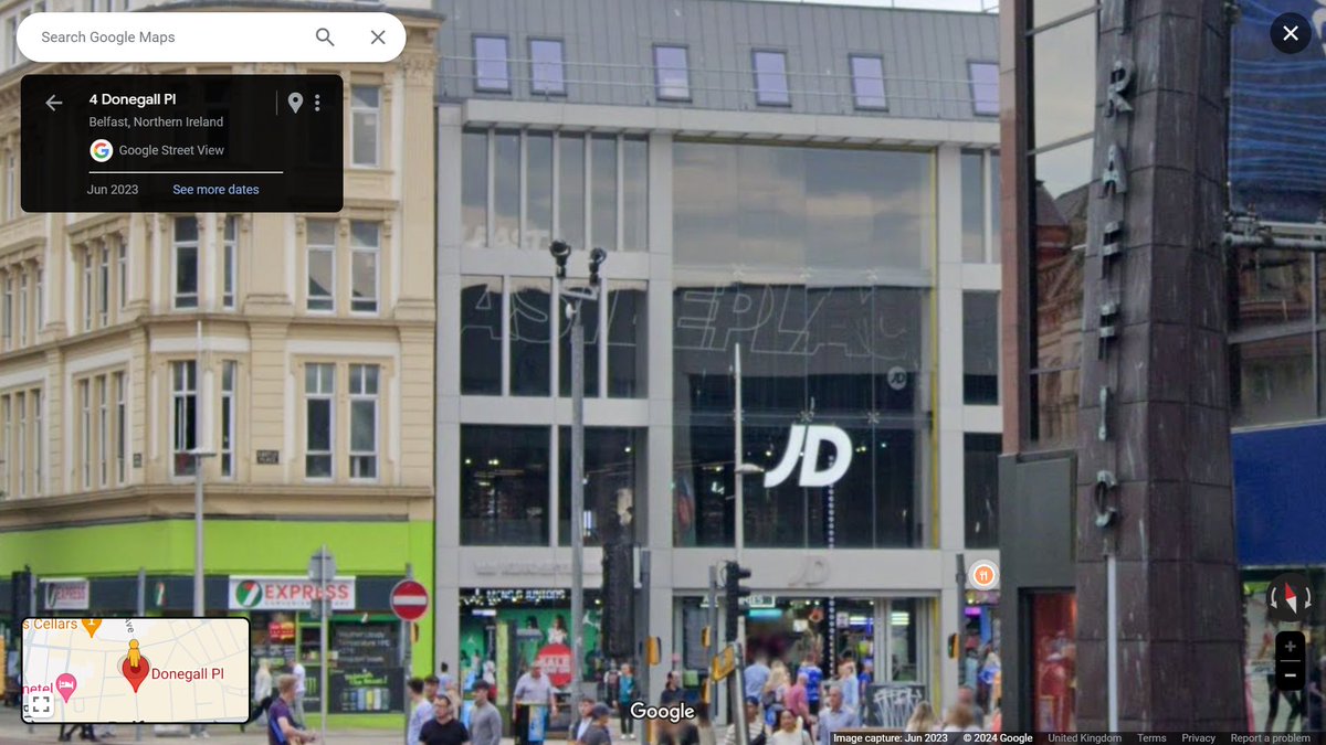 The black and white pic is looking north from the junction of Donegall Place and Castle Place, this way. The glorious building in the middle was the old Ulster Club, the demolition of which was one of many architectural crimes. Look at the modern tat all round that replaced it