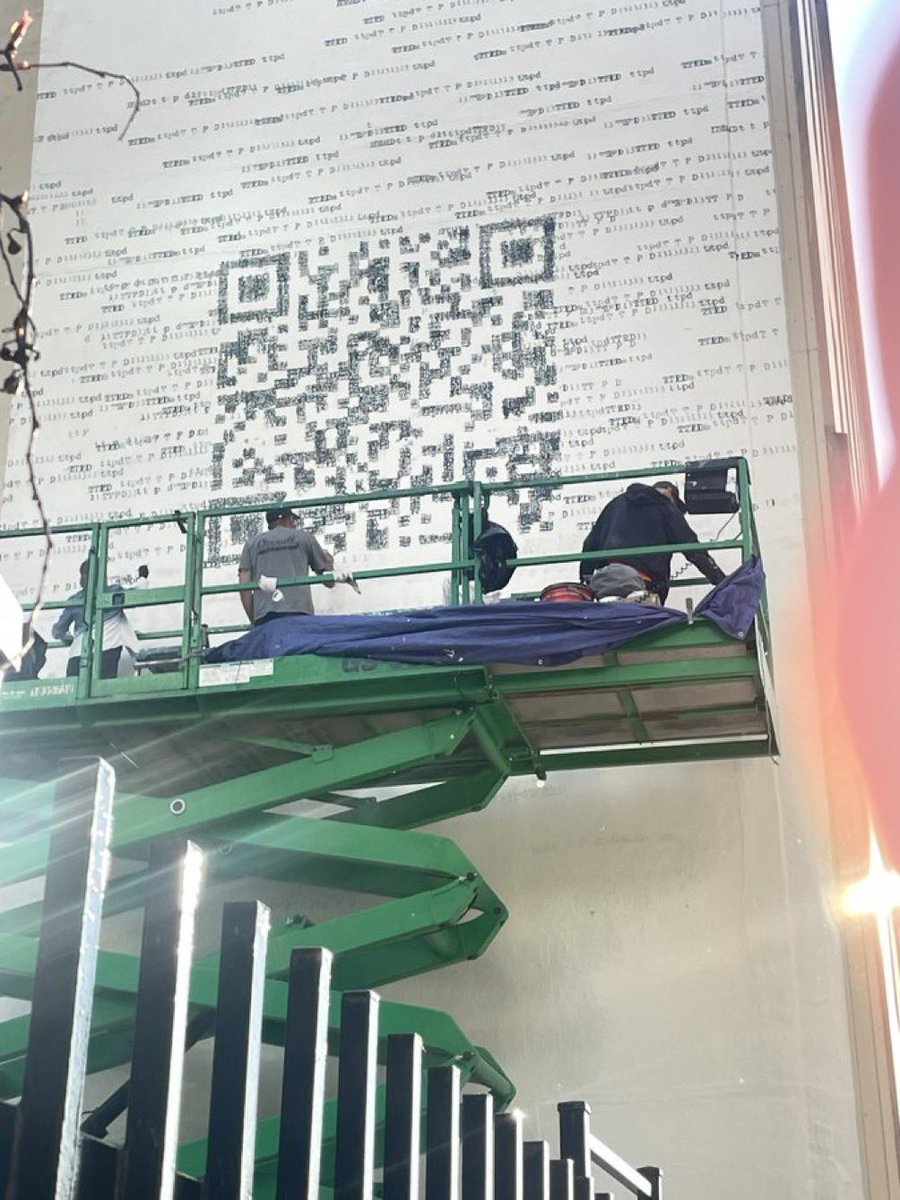 SwiftNYC's tweet photo. 🚨 A billboard went up in Chicago of a QR code that currently scans to a video that reads ‘Error 321’ … The same error appeared on her website the night at the 2024 #GRAMMYs just before she announced #TSTTPD 👀🤍

What are you up to @taylorswift13? 

QR Link: https://t.co/WaMAp9tGZS

📸 @folklaura_ & @urgrltrinity