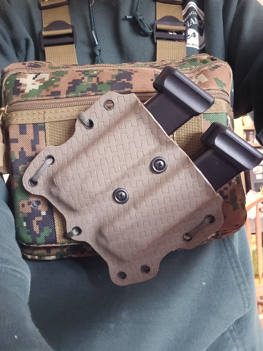 RedBeard081's tweet photo. @Onijps I made this mag holster for the wife. Does that count? Also made her a trigger guard that clicks into any of her purses so she is always covered.  Seems to me that most stuff in the 2a community is based on function, not on genitals. Seems logical to me. https://t.co/4GWX1UvZdT