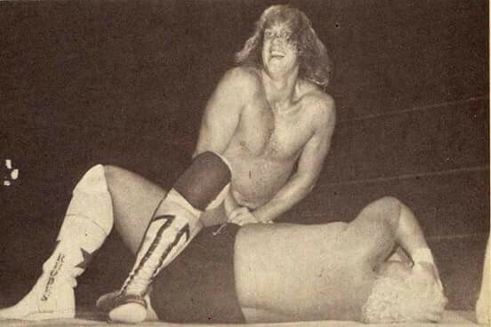 The late #DavidVonErich was not just a star in his home state of Texas but ventured to Florida as a vicious rulebreaker. Here he is with the dreaded #IronClaw on #DustyRhodes. #ML