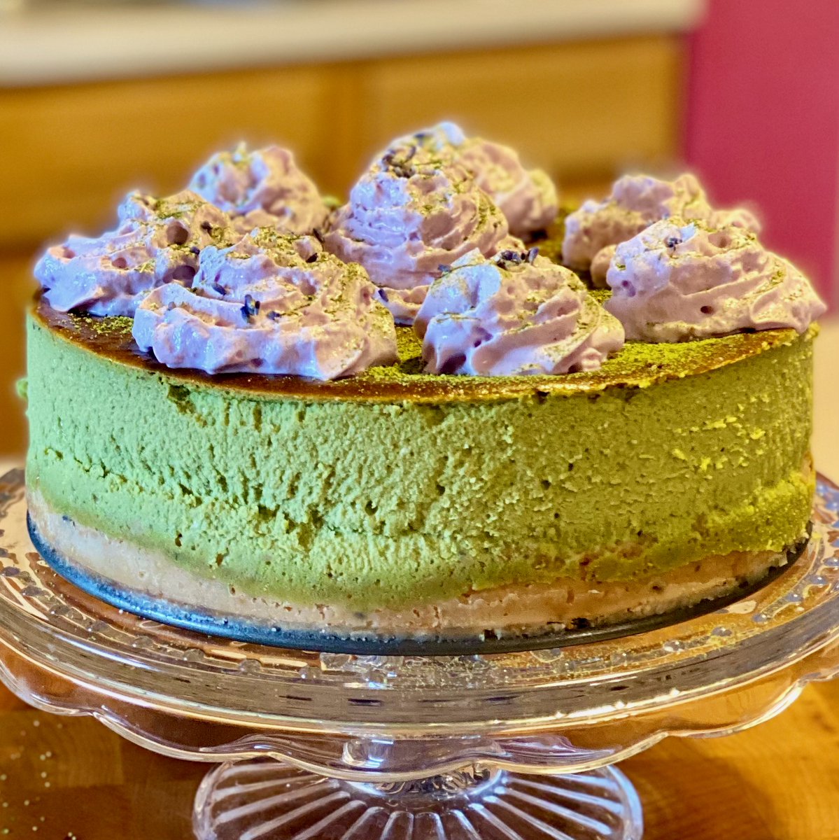 Matcha cheesecake with a lavender shortbread crust and lavender-lemonade whipped cream.