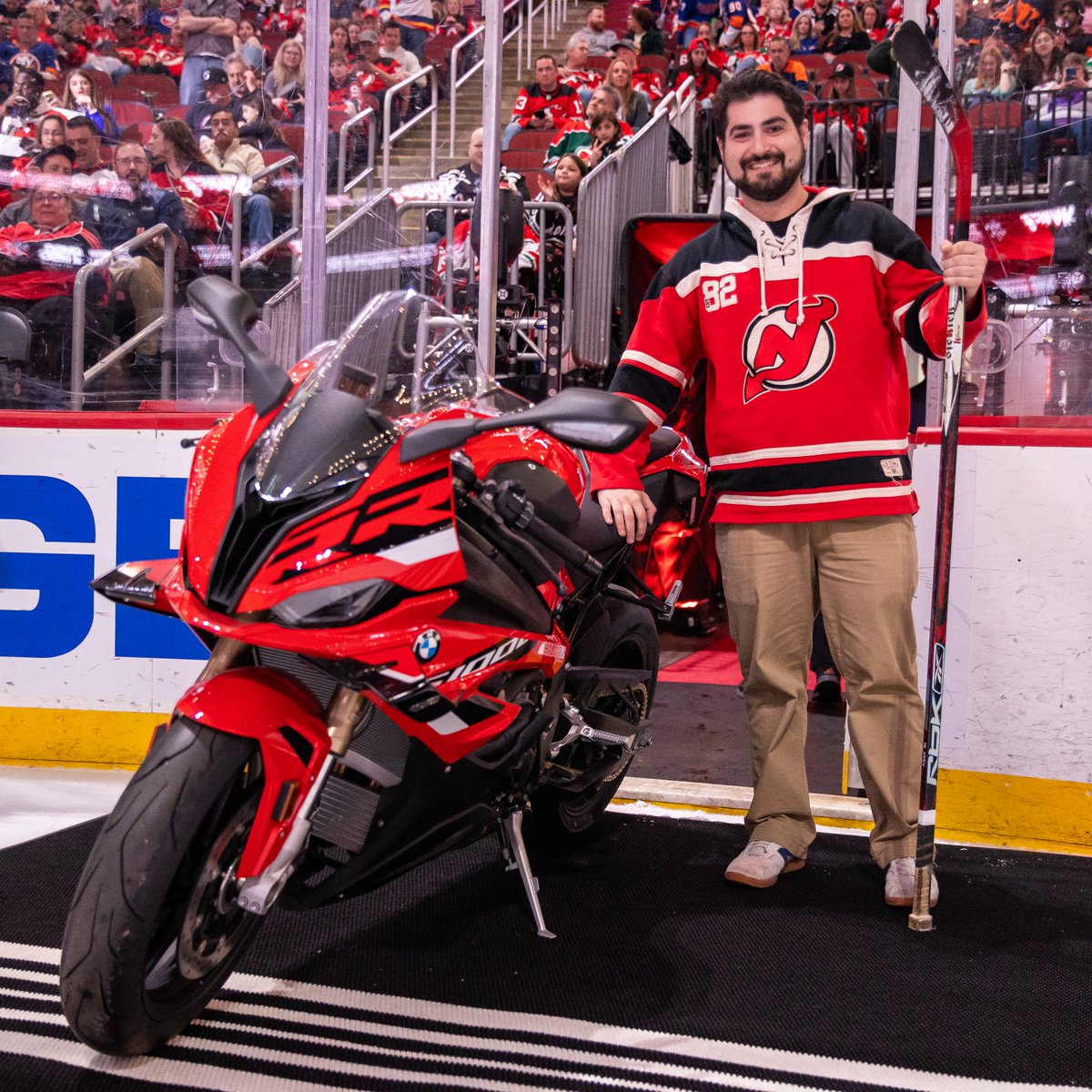 Leaving tonight's game in style. Congrats to Michael, who brings home this custom motorcycle signed by the team! #NJDevils | @Halmarusa