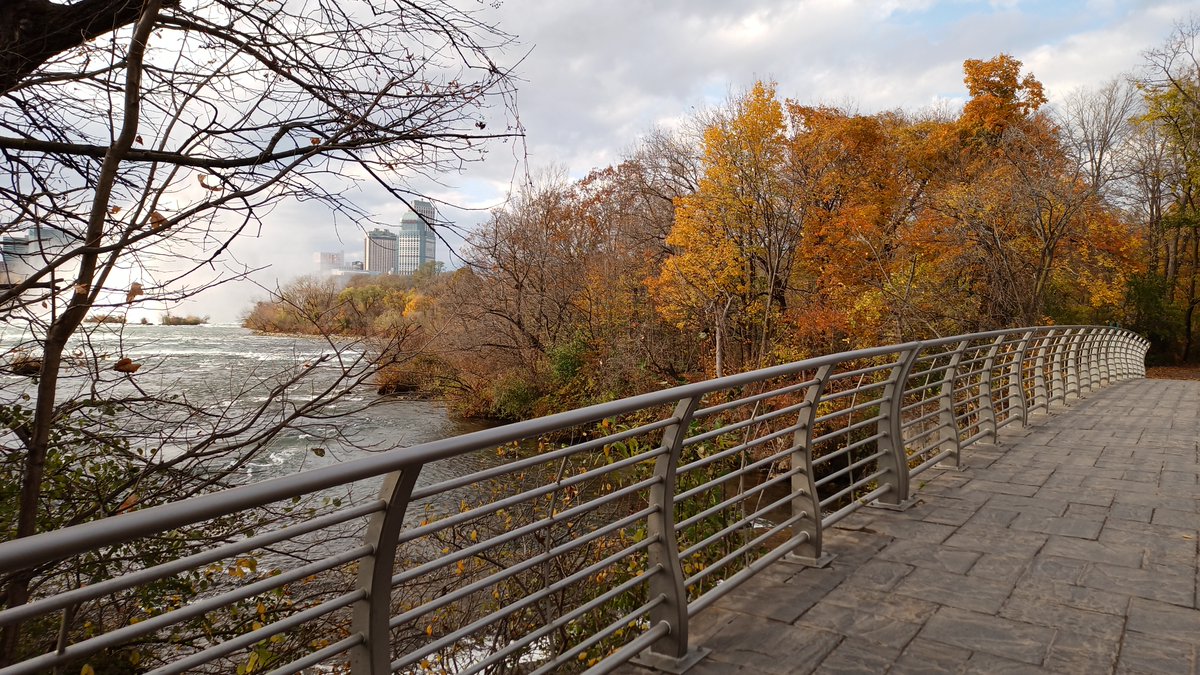 FototakerTony's tweet photo. Who knows how many people has crossed over this bridge to #ThreeSistersIslands at #GoatIsland? Have you crossed this path and looked at the buildings of #NiagarafallsOntarioCanada? @BuffaloNiagara @VisitNiagaraUSA #WNY @NiagaraFallsUSA @Canada @visitniagara1 @TourismNiagara @CanadaNY