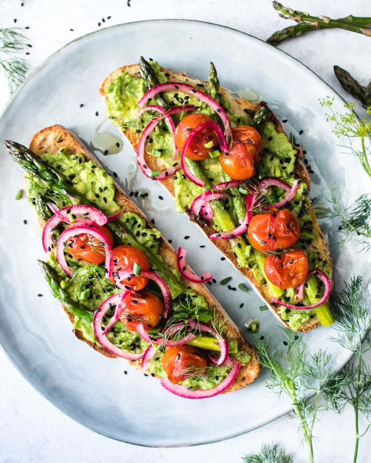 Healthy vegan breakfast with roasted asparagus, avocado , red onion, cherry tomatoes, black sesame seeds with olive oil . #vegan #healthy #green #food #nodrugs #nowar #nojunkfood #junkfoodkills