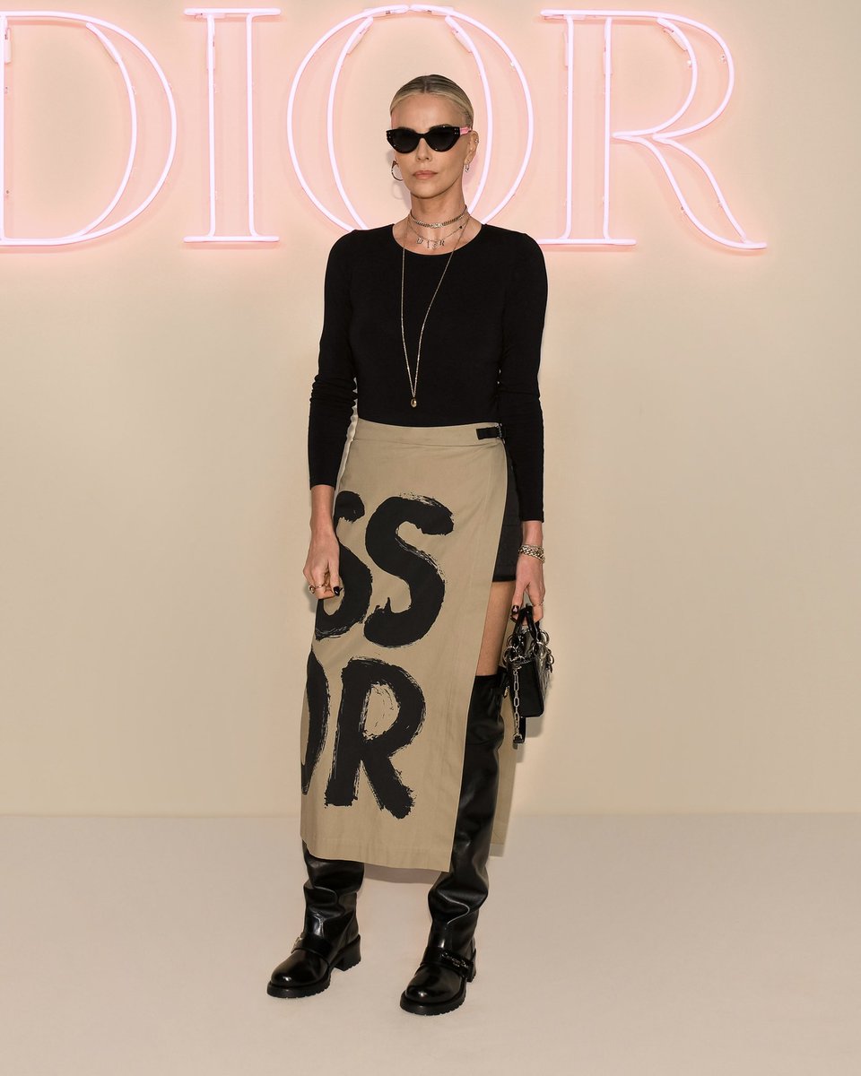 Dior's tweet photo. Expressive elegance.
Dior ambassador @CharlizeAfrica upped the #StarsinDior quotient at the #DiorFall24 show in New York https://t.co/dhE2uhEyYa, wearing a #DiorAW24 look by Maria Grazia Chiuri featuring a 'Miss Dior' manifesto print wrap skirt. https://t.co/5KGQmb8qX8