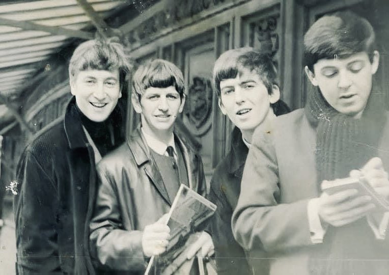 I love 1963 Beatles. Ringo clings to their debut album, he, John and George beam for yet another camera, and Paul scribbles his autograph again.