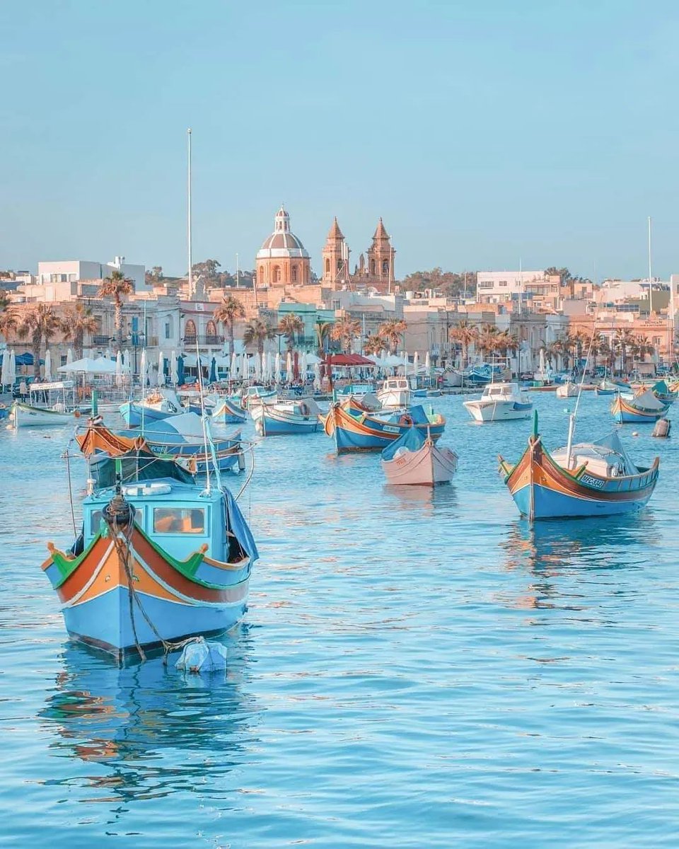Did you know that, "Marsaxlokk" derives its name from the Arabic word 'marsa', meaning harbour, and Maltese for the south-easterly Mediterranean wind, the Xlokk (Sirocco in Italian)? 🐟✨ [ 📸 @marsaxlokk_village ] #VisitMalta #ExploreMore #MoreToExplore