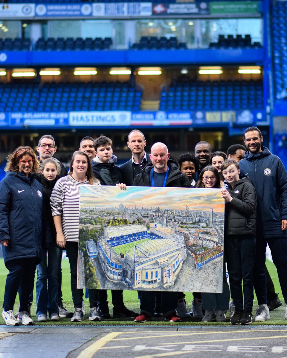 The finished painting. 🎨👏 Using the power of football and art to raise awareness for autism. 💙 #WorldAutismAwarenessMonth
