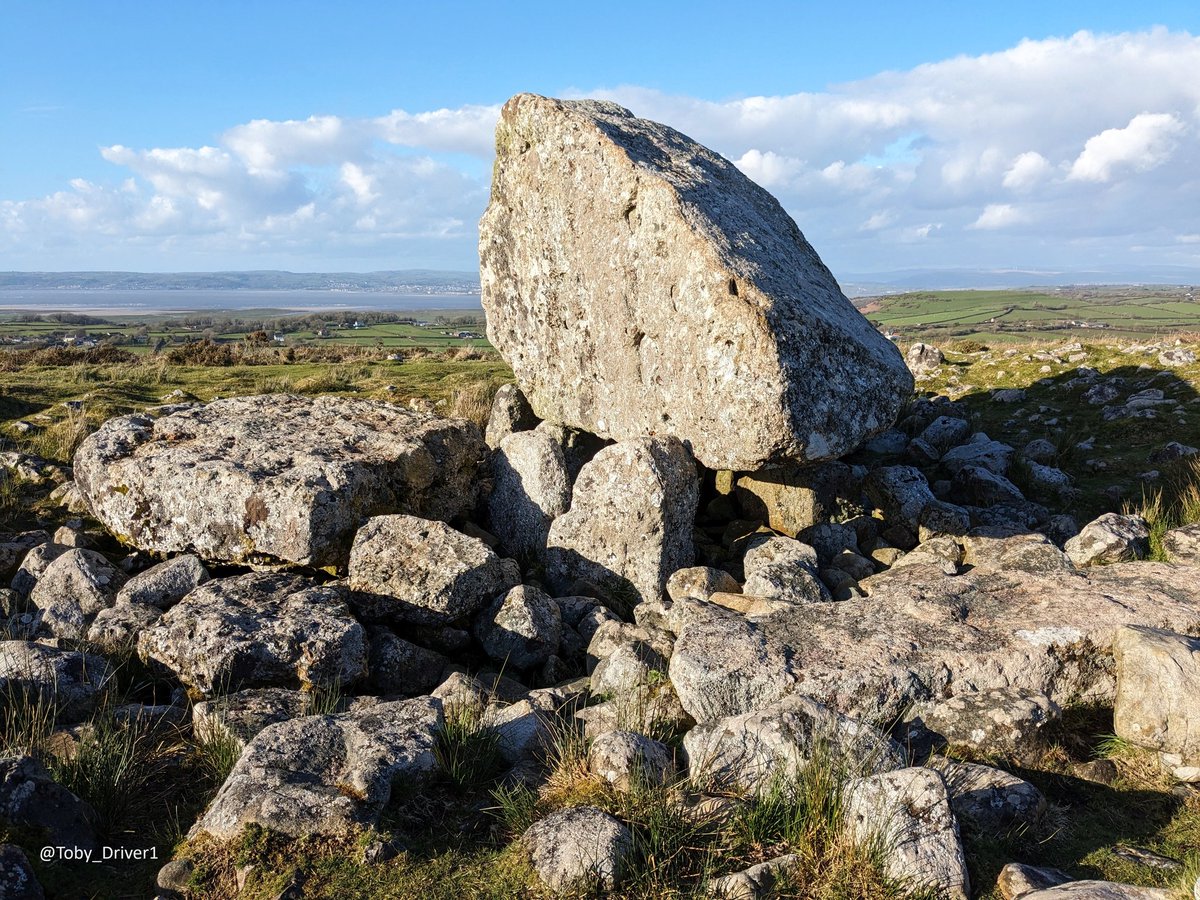 #TombTuesday Evening sunlight last week on the spectacular #Neolithic tomb of Maen Ceti or Arthur's Stone on Cefn Bryn, Gower. Twin chambers were formed by hollowing out the ground beneath a massive glacial erratic, which subsequently split sometime in the past. 📷 My own